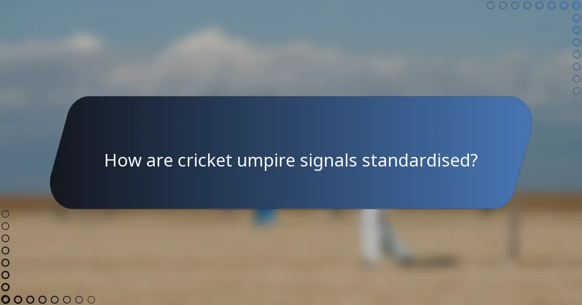 How are cricket umpire signals standardised?